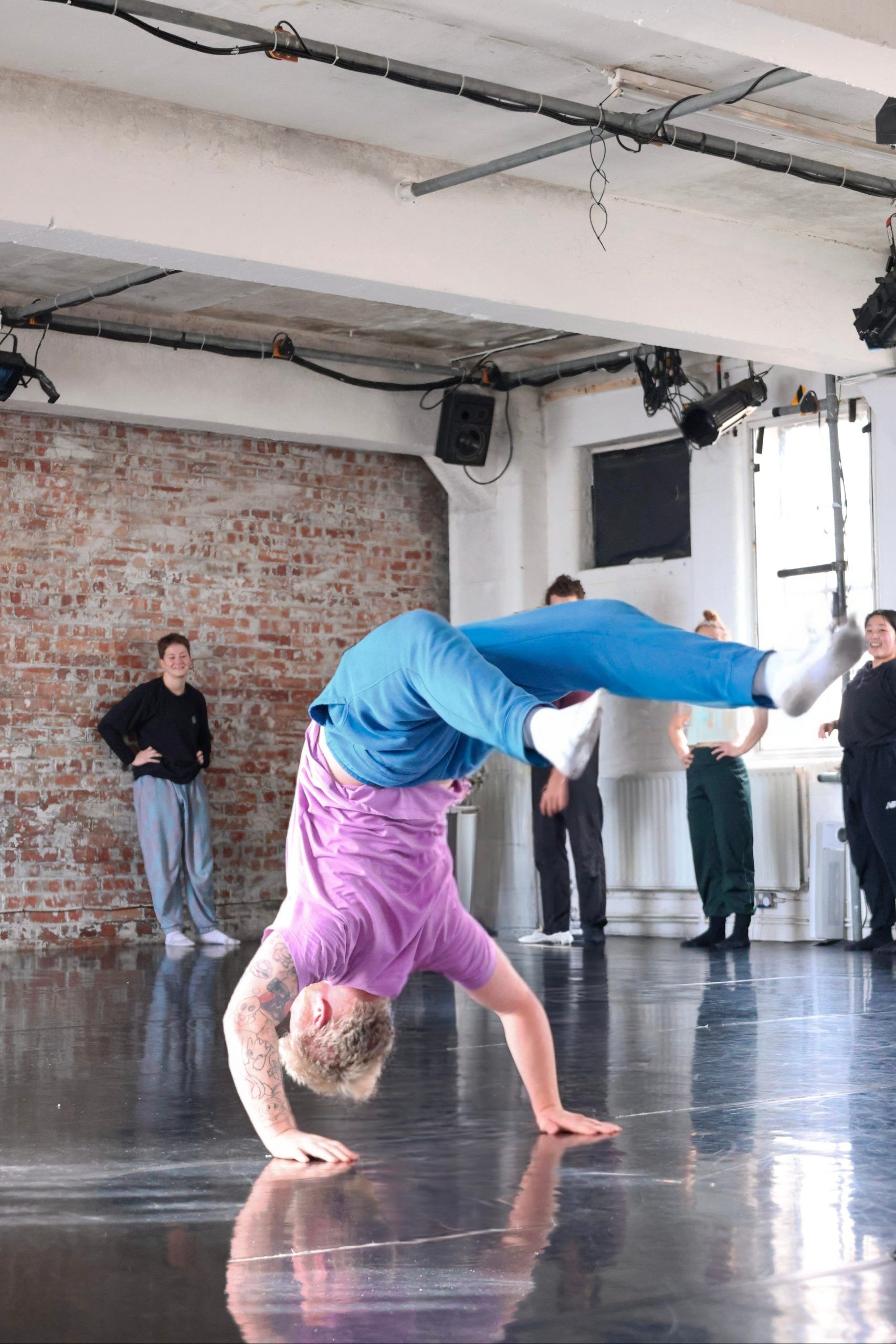 Dan Thatcher performing an acrobatic back bend
